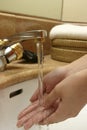 Wash hand at sink Royalty Free Stock Photo