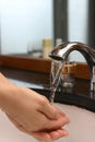 Wash hand at sink Royalty Free Stock Photo