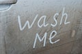 Wash me written on a dirty car Royalty Free Stock Photo