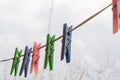 Wash things. clothesline. Clothes pegs. Drying things. Multi-colored clothespins. The photo is suitable for sites selling detergen Royalty Free Stock Photo