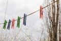 Wash things. clothesline. Clothes pegs. Drying things. Multi-colored clothespins.  cleaning company Royalty Free Stock Photo