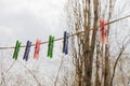 Wash things. clothesline. Clothes pegs. Drying things. Multi-colored clothespins.  cleaning company Royalty Free Stock Photo