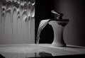 washbasin and metallic faucet with water drop at home