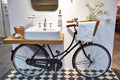 Washbasin and retro bicycle in bathroom Royalty Free Stock Photo