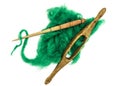 Washed Angora wool for felting or knitting. The distaff and spindle closeup on a white background. Royalty Free Stock Photo