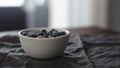 washed blueberries in white bowl on table