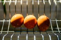 Washed clean eggs on sink drainer in kitchen Royalty Free Stock Photo