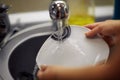 Washed Dishes- close up of wash the dishes in the kitchen Royalty Free Stock Photo