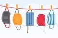 Washed Protective Face Masks Hanging on a Line. Drying Laundered Reusable Masks Royalty Free Stock Photo