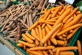 Washed and unwashed carrots in a supermarket