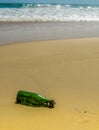 Washed up bottle on beach