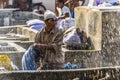 A washer at the Dhobi Ghat in Mumbai wrings his clothing in the Dhobi Ghat in Mumbai