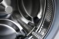 Washer drum close up, washing machine inside, laundry concept Royalty Free Stock Photo