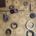 Washers and gaskets on wall Royalty Free Stock Photo