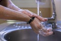 Washing arms and hands properly. Hygiene concept. Rubbing with soap and water Royalty Free Stock Photo