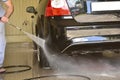 Washing the car at the carwash Royalty Free Stock Photo