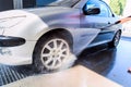 Washing car with pressure washer Royalty Free Stock Photo