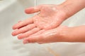 Washing children`s hands under the tap. No COVID-19