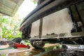 Washing and cleaning the car radiator cooling panel, mold stains on the very dirty car air-conditioning coil Royalty Free Stock Photo