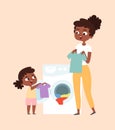 Washing clothing. Parents children cleaning house. Happy afroamerican daughter and mother with t-shirt near wash mashine