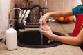 Washing the dishes - child hands cleaning a glass with sponge, s Royalty Free Stock Photo