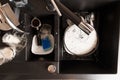 Dirty dishes in the sink in the kitchen top view Royalty Free Stock Photo