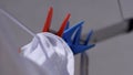 Brightly coloured clothes pegs on a washing line Royalty Free Stock Photo