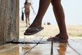 Washing feet after beach