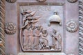 Washing of the Feet on the San Ranieri gate of the Cathedral St. Mary of the Assumption in Pisa Royalty Free Stock Photo