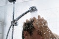 Washing hair with shampoo. Man in shower. Cold or hot water. Conditioner, gel or foam. Hairline, loss, dandruff or damage concept.