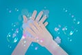 Washing hand with soap and soapbubbles. Royalty Free Stock Photo