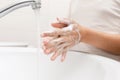 Washing hands in the bathroom Royalty Free Stock Photo