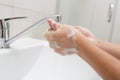 Washing hands in the bathroom Royalty Free Stock Photo