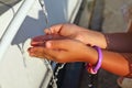 Washing of hands of little girl by water from pipe Royalty Free Stock Photo