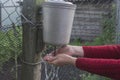 Washing of hands in an old rural washstand Royalty Free Stock Photo