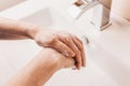 Washing hands rubbing with soap to covid prevention