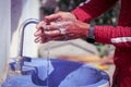 Washing of hands with soap under running water,Close-up Of Applying Soap While Washing Hands Royalty Free Stock Photo