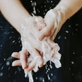 Washing hands under running water to prevent coronavirus contamination Royalty Free Stock Photo