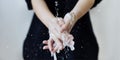 Washing hands under running water to prevent coronavirus contamination Royalty Free Stock Photo