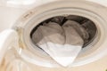 The washing hatch. Washing machine, white for laundry with white terry towel