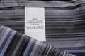 Washing instruction label on cotton vertical stripes shirt