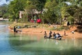 Washing and laundry in clean lake canal water