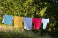 Washing line with clothes outdoors on sunny day Royalty Free Stock Photo