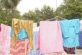 Washing line with drying clothes in outdoor. Clothes hanging on washing Royalty Free Stock Photo