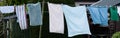 Washing line with towels drying in the garden Royalty Free Stock Photo