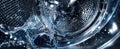The washing machine in action with water splashing inside..AI generated image Royalty Free Stock Photo