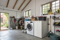 Washing machine with cabinet in attic garage Royalty Free Stock Photo