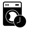 Washing machine and clock timer solid icon, washing concept. Vector graphics. Schedule of automatic wash, waiting sign Royalty Free Stock Photo