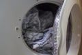 Washing machine with dirty clothes