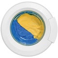 Washing machine door clean clothes yellow blue Royalty Free Stock Photo